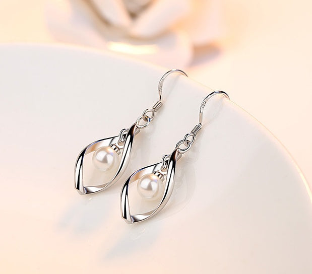 Reverse pearl earrings